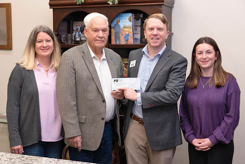 (L to R) Stephanie Visina, Oklahoma County Farm Bureau administrator; Bruce Wilson, Oklahoma County Farm Bureau president, Andrew Shepard, Regional Food Bank of Oklahoma development officer; Lauren Horsley, Oklahoma County Farm Bureau secretary.